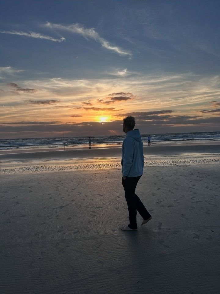 Owen Nurminen on the beach at sunset