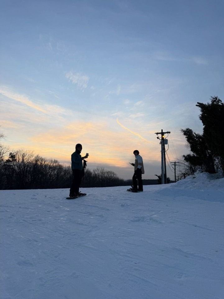 Snowboarding at sunset